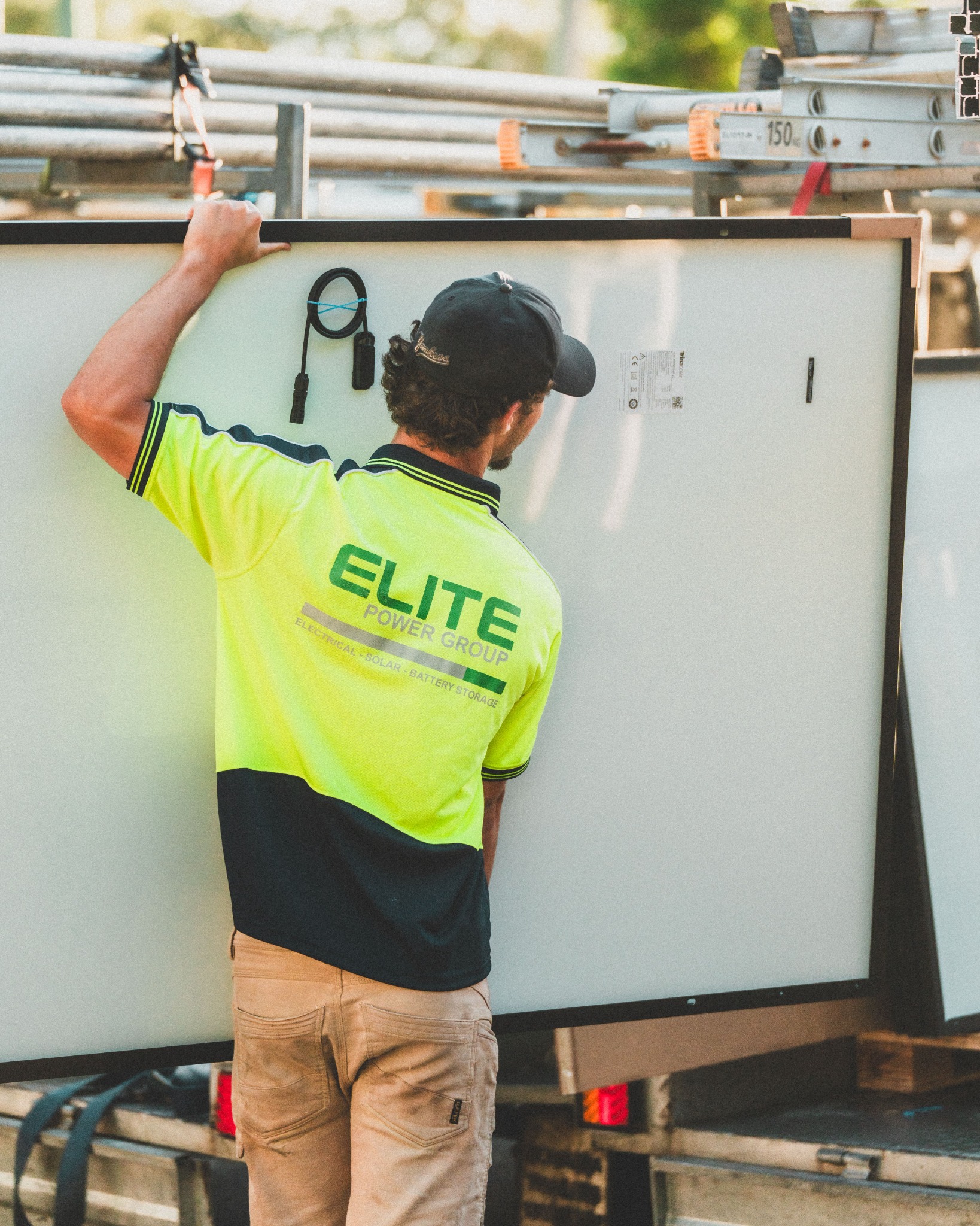 Worker handling a panel