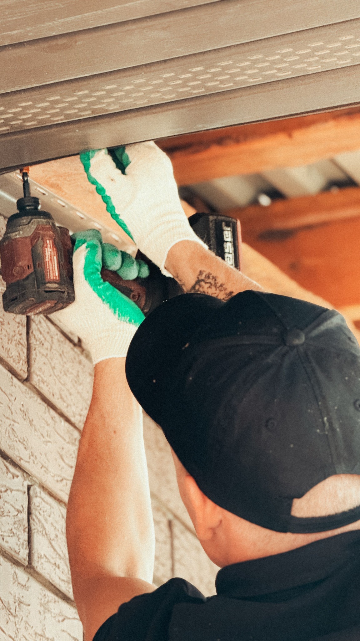 Worker using a drill